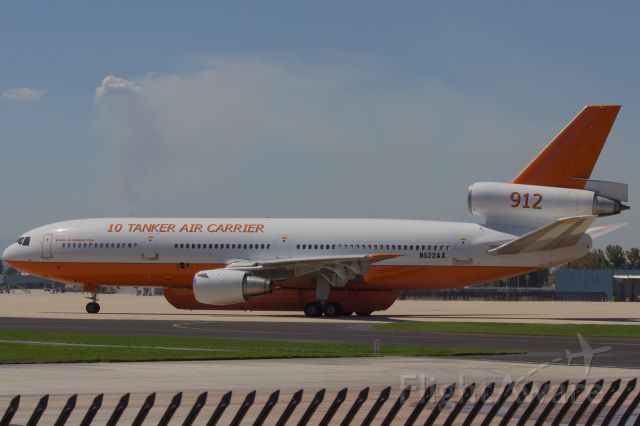 McDonnell Douglas DC-10 (N522AX) - Taxing from USFS Tanker base San Bernardino to make a drop on the Silverado Fire in Orange County, California (The fire is in the background) on 9-13-14. 