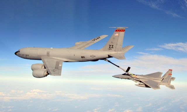 — — - KC-135 refueling a F-15