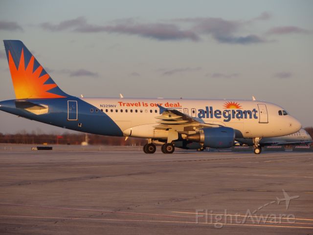 Airbus A319 (N329NV) - An Allegiant Air A319 pulls into gate 9 after A flight from A319. 