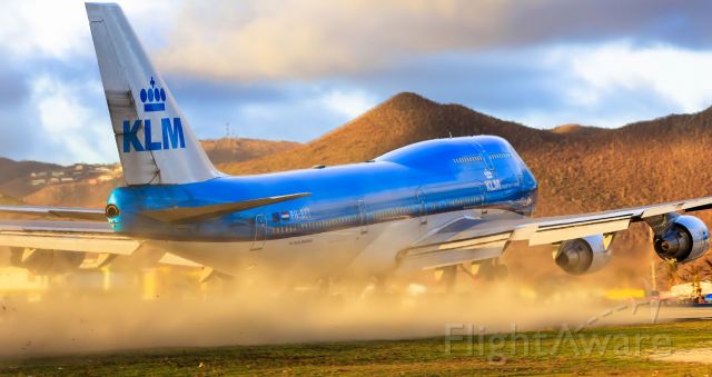 Boeing 747-400 (PH-BFT) - KLM PH-BFT seen departing TNCM St Maarten at sunset while blowing the runaway clean!!