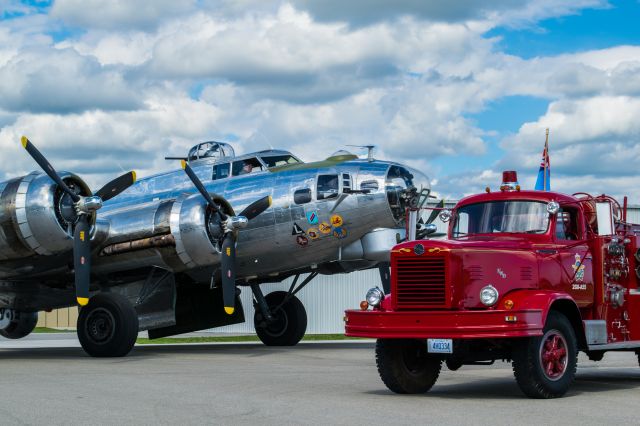 Boeing B-17 Flying Fortress (N3193G) - A 1955 FWD / Thibeaut F1000Tpumper sits Yankee Lady B-17 N3193G at Chatham-Kent airport CYCK. br /br /This fire truck served Canadian Froces Base Trenton when it became the only fire truck to welcome the CF-105 Avro Arrow RL204 away from its home at Pearson Airport in Malton.
