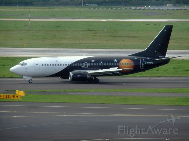 BOEING 737-300 (G-POWC) - Titan Airways B737-33A(QC) G-POWC taxiing to terminal DUS after landing on 23L. Photo made 12.09.2015.