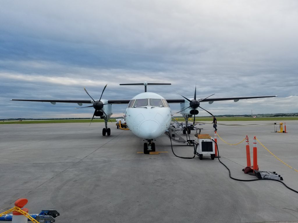 de Havilland Dash 8-100 — - Boarding to Calgary.