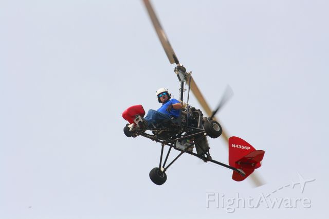 N4356P — - Thomas Gage making a slow pass overhead in his experimental autogyro.