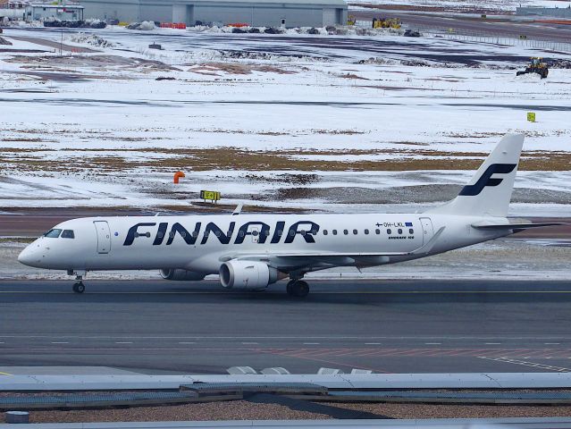 Embraer ERJ-190 (OH-LKL) - Flight from Frankfurt to Helsinki. Photo taken March 21 2021, from the scenic terrace at the Helsinki Vantaa airport.