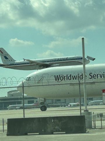 N365UP — - A Chance meeting between A United retro and UPS Non-wingletted B767-300Freighter a MIA