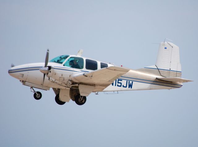 Beechcraft Travel Air (N15JW) - Departing EAA Airventure/Oshkosh on 25 July 2012.