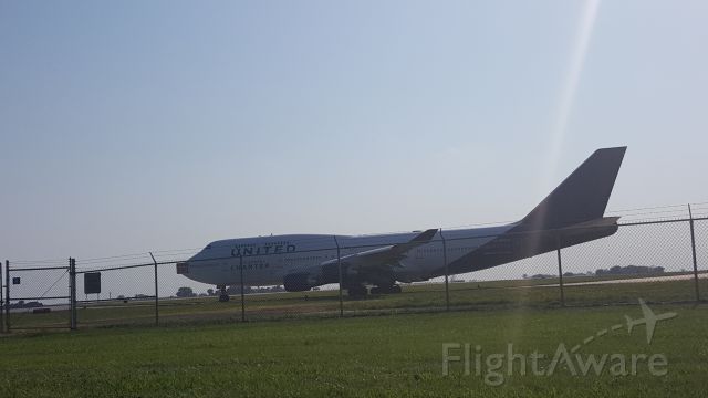 Boeing 747-400 (N194UA) - United military charter taxiing for takeoff at Cedar Rapids, Iowa.