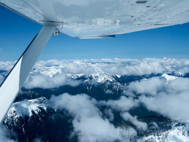 Cessna Skylane RG (N6143T) - Over Olympic Mountains