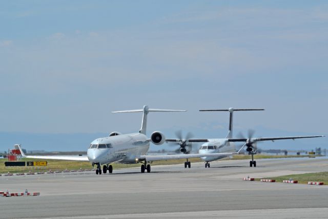 Canadair Regional Jet CRJ-900 (C-FCJZ) - Bombardier regionals taxiing out to Rwy 26L AC8114, 8572