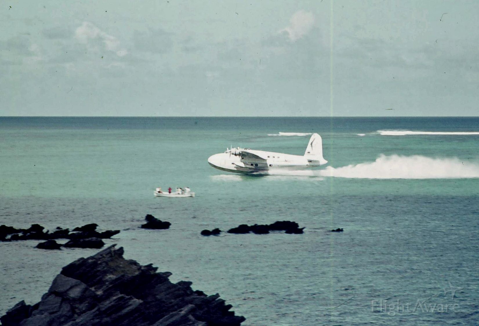 Short Sandringham (VH-BRC) - Sunderland/Sandringham conversion Beachcomber taking off from Lord Howe Island c. 1974 - one of the last flights on the Rose Bay service. Departure from Rose Bay depended on arriving at Lord Howe lagoon at high  tide. Island airstrip was being built at this time and later serviced Fokker Friendship from Sydney, ending Flying Boat commercial services in Australia.