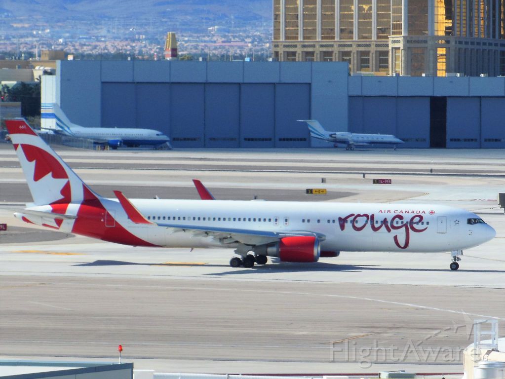 BOEING 767-300 (C-GHLV) - Air Canada Rouge (RV) C-GHLV B767-333 ER [cn30852]br /Las Vegas (LAS). Air Canada Rouge flight RV1833 departing for Vancouver (YVR). br /Taken from Staff Car Park Level 6 (above Terminal 1)br /2016 02 18     a rel=nofollow href=http://alphayankee.smugmug.com/Airlines-and-Airliners-Portfolio/Airlines/AmericasAirlines/Air-Canada-Rouge-RV/i-5JvNfg4https://alphayankee.smugmug.com/Airlines-and-Airliners-Portfolio/Airlines/AmericasAirlines/Air-Canada-Rouge-RV/i-5JvNfg4/a