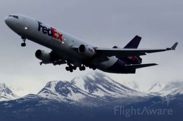 Boeing MD-11 (N574FE) - Takeoff from Runway 15-33, with Flattop