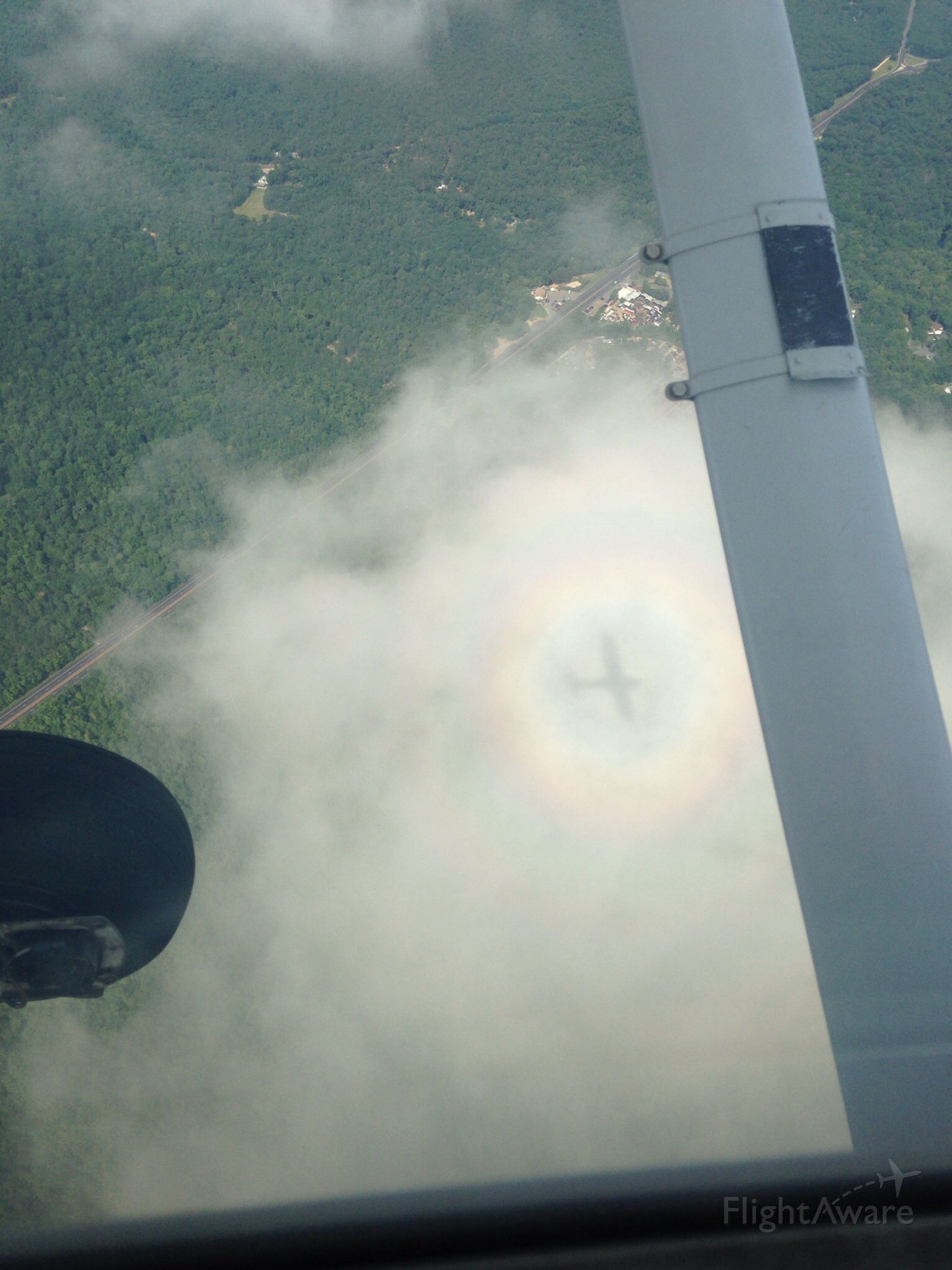 Experimental 100kts-200kts (N1075F) - Saw my shadow took the pic and then afterwords noticed the rainbow around the plane