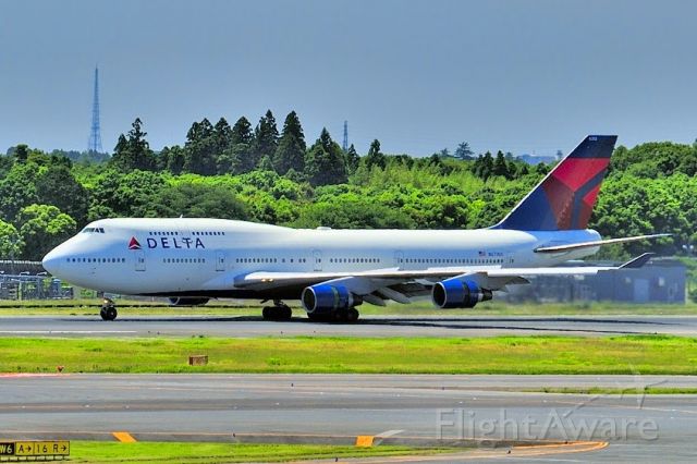 Boeing 747-400 (N673US) - Jun-2014. Landing and Reversing