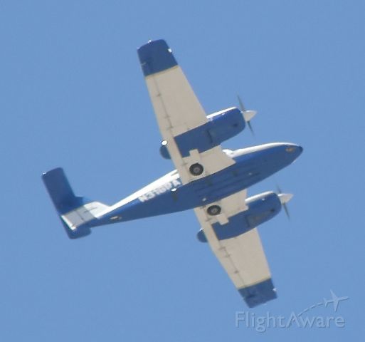 Piper PA-44 Seminole (N316PA) - Bottom Shot of White and Blue Twin Prop