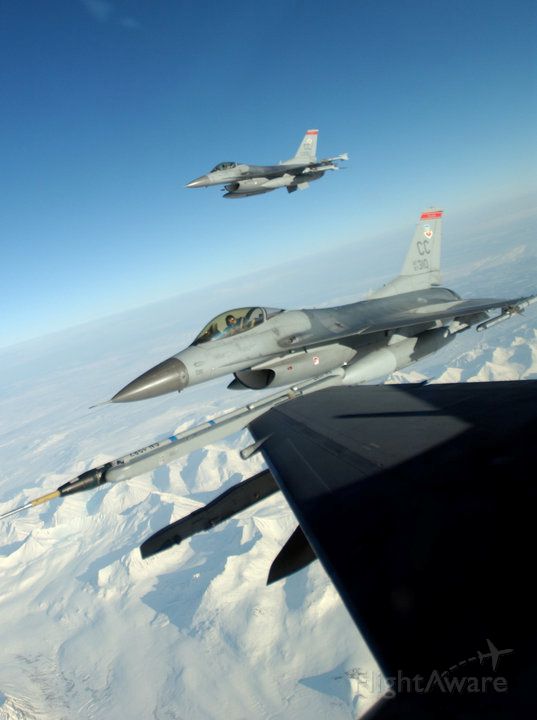 — — - 3 F-16s in flight from 522nd Fighter Squadron