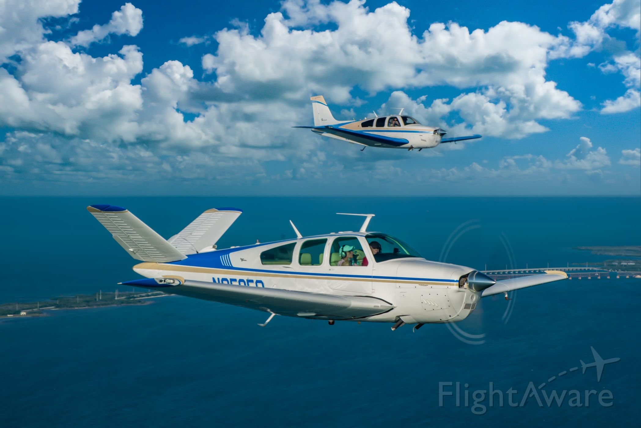 Beechcraft 35 Bonanza (N9585Q) - Father and Son formation flight over Florida Keys