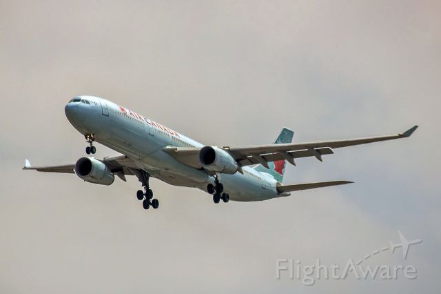 Airbus A330-300 (C-GHKW) - Photo by John A Miller, a rel=nofollow href=http://www.PhotoEnrichments.comwww.PhotoEnrichments.com/a