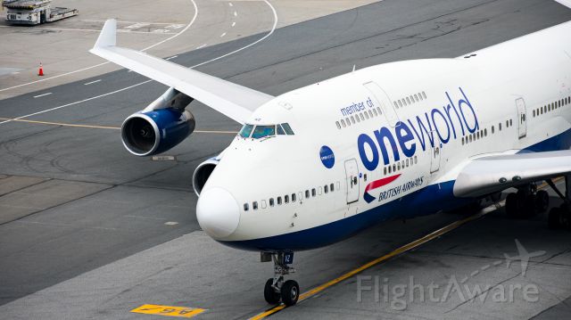 Boeing 747-200 (G-CIVZ) - British Airways 747 One World taxing into her gate.