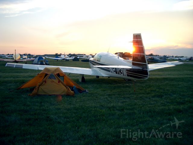 N2713W — - Camping under the wing with Markey the M20C Mooney at Fond Du Lac. Airventure 2006.