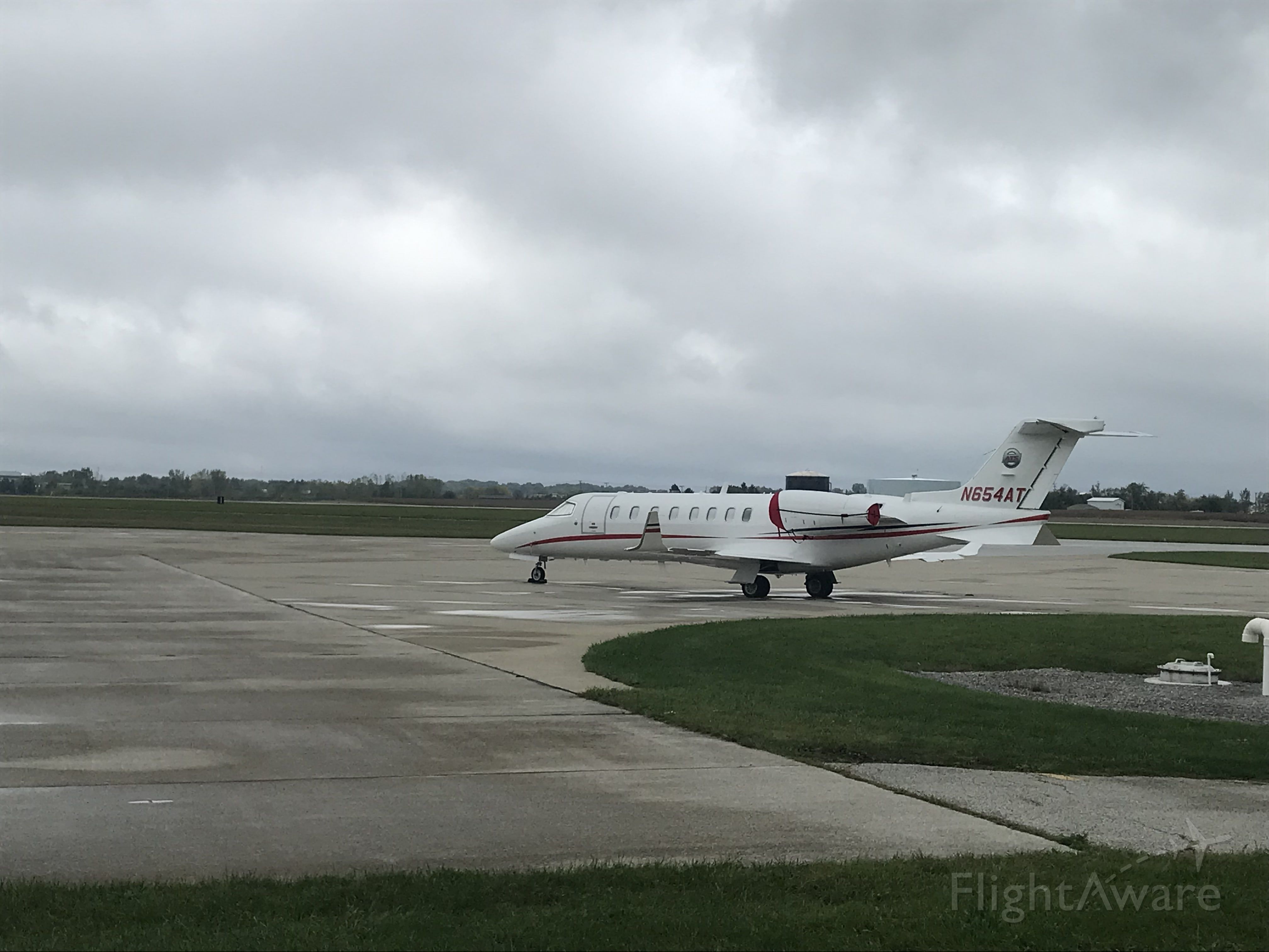 Bombardier Learjet 75 (N654AT) - Anderson Trucking's Learjet 75 all cozied up after arriving from St. Cloud, MN. 10/4/21.