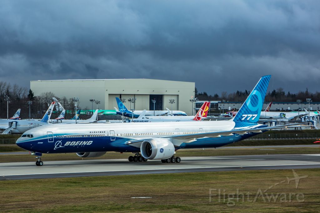 BOEING 777-9 (N779XW) - After three and a half hours of weather delays Boeing scrubbed the first flight of the 777X (777-9). Here the Dash 9 taxis back to the lineup at 2:34 PM 1-24-2020