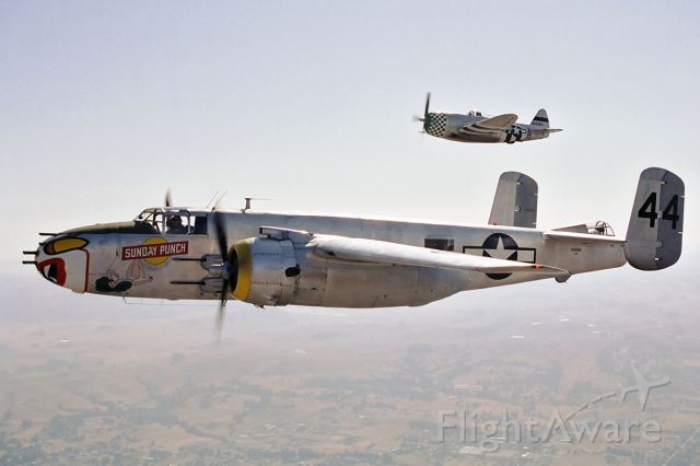 N325N — - The North American B-25J Mitchell Sunday Punch flying with a Republic P-47D Thunderbolt escort somewhere over northern California.