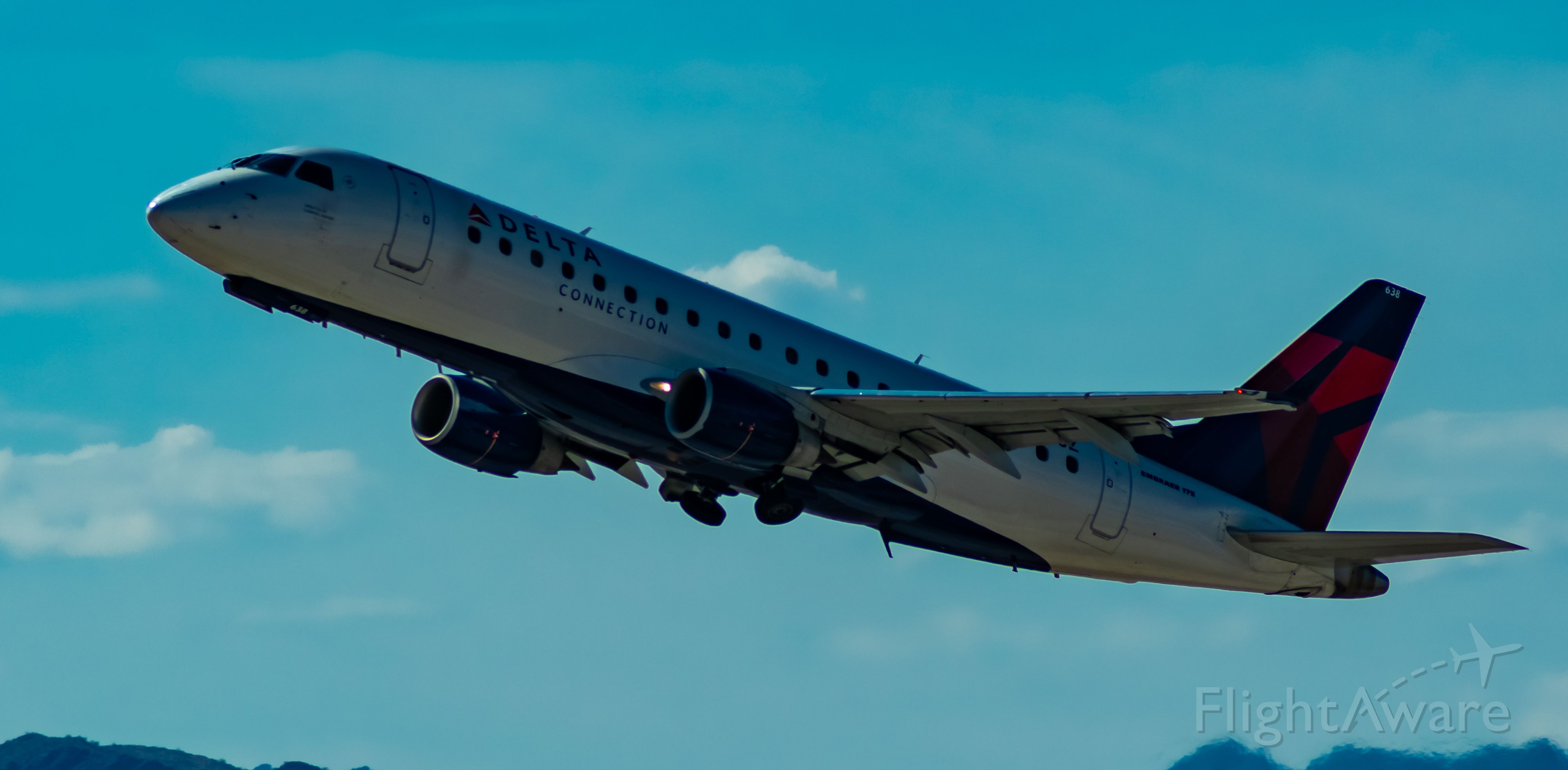 Embraer 175 — - Departing RWY 7L