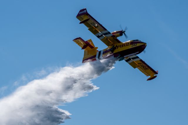 Canadair CL-415 SuperScooper (N417BT) - Bridger Aerospace's CL-415 dumps 1500+ gallons of water over Lake Conroe during a demonstration on 10 February 2022