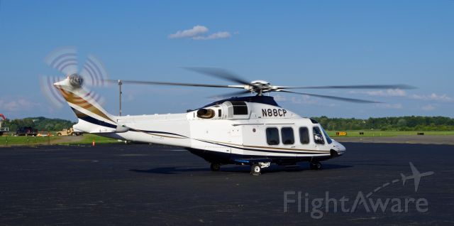 BELL-AGUSTA AB-139 (N88CP) - MORRISTOWN, NEW JERSEY, USA-AUGUST 09, 2018: Seen on the ground at Morristown Municipal Airport preparing for take-off was a Bell-Agusta AB-139 helicopter, registration number N88CP.