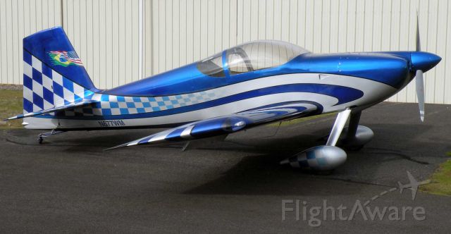 Vans RV-7 (N677WM) - Mauricio's sharp RV-7, headed for home in Brazil....electric blue paint by Artistic Aviation in ORegon