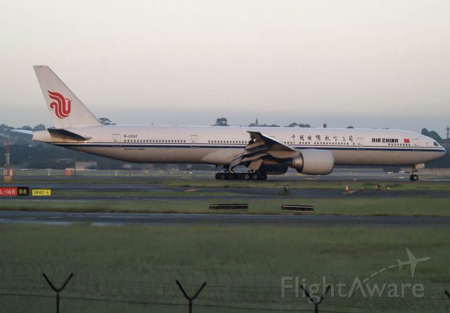 BOEING 777-300ER (B-2087) - B-2087 Arrives on 34L from Beijing at dawn. Taken from The Mound with a 70-300mm