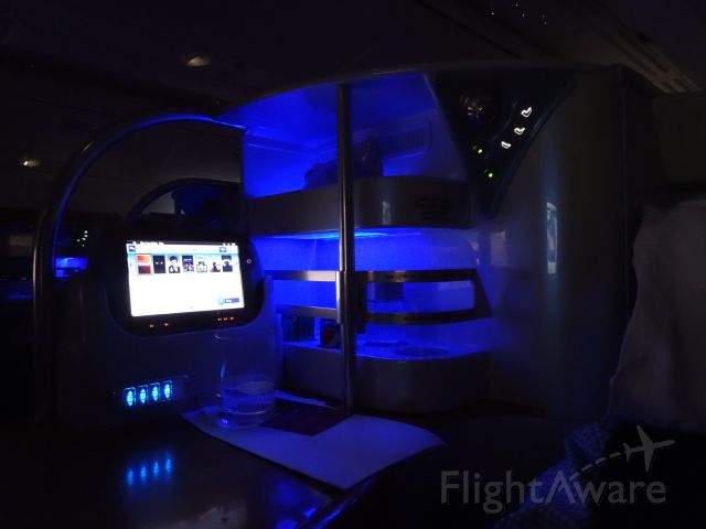 Airbus A380-800 (A6-EDV) - Enroute as EK2, night lighting in business class. 