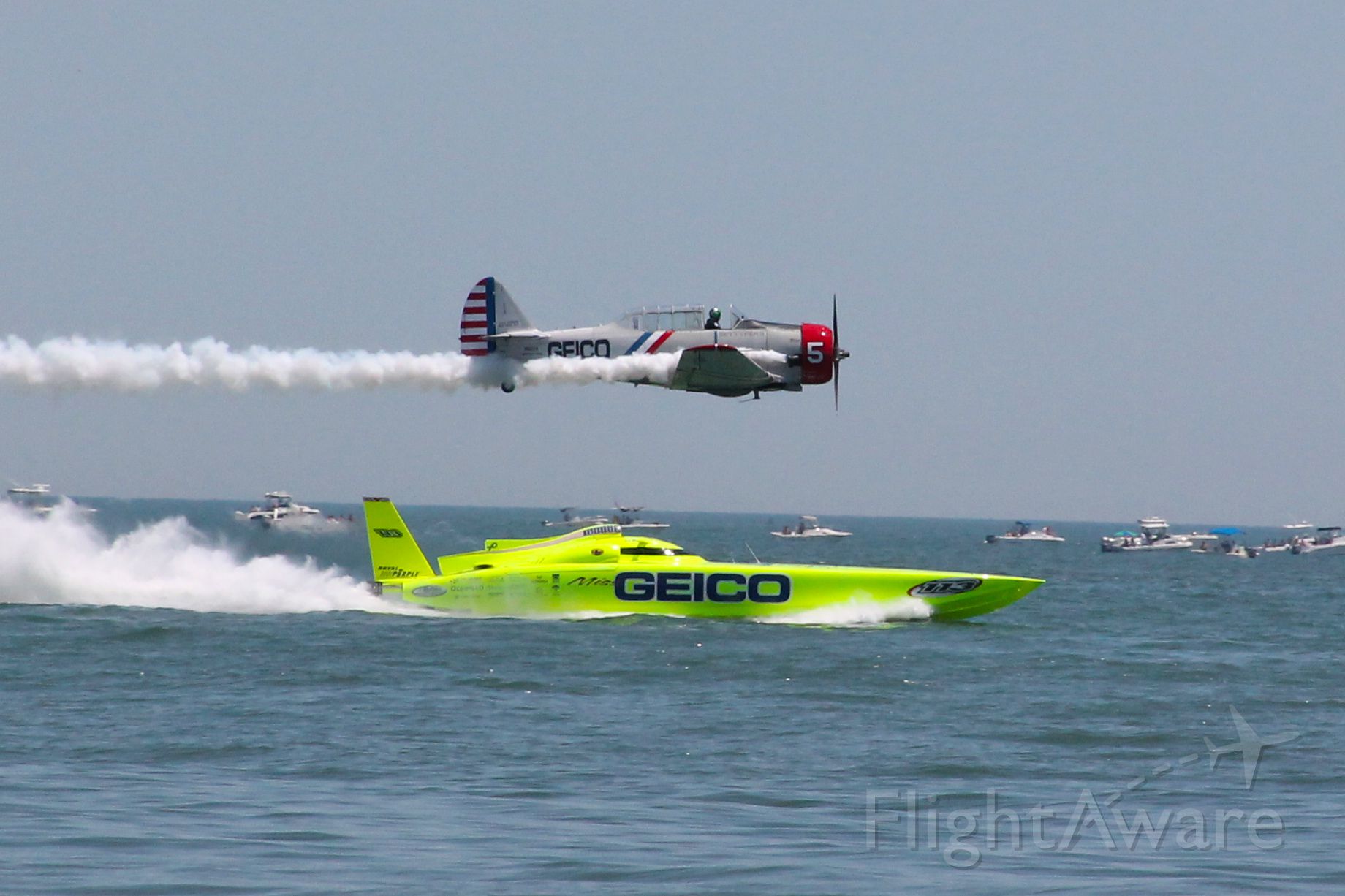 — — - From thel Ocean City Air Show in Ocean City Maryland on June 12, 2012.  This is Geico Skytyper 5 racing Miss Geico Cigar Boat.