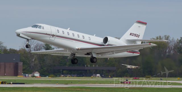 Cessna Citation Sovereign (N315QS) - Taken about four months ago (in October, 2014).  While visting the US Air Force Museum in Ohio, stopped at the Ohio State University airport in Columbus to check it out and caught this Cessna 680 taking off from runway 27L. There are already several pics of this one in the FA gallery but none show it in the air so I figured it would be neat to post this airborne snap of it. 