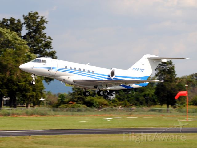 Hawker Beechcraft 4000 (N402SE) - Gorgeous Hawker 4000 blasting out of Winchester!