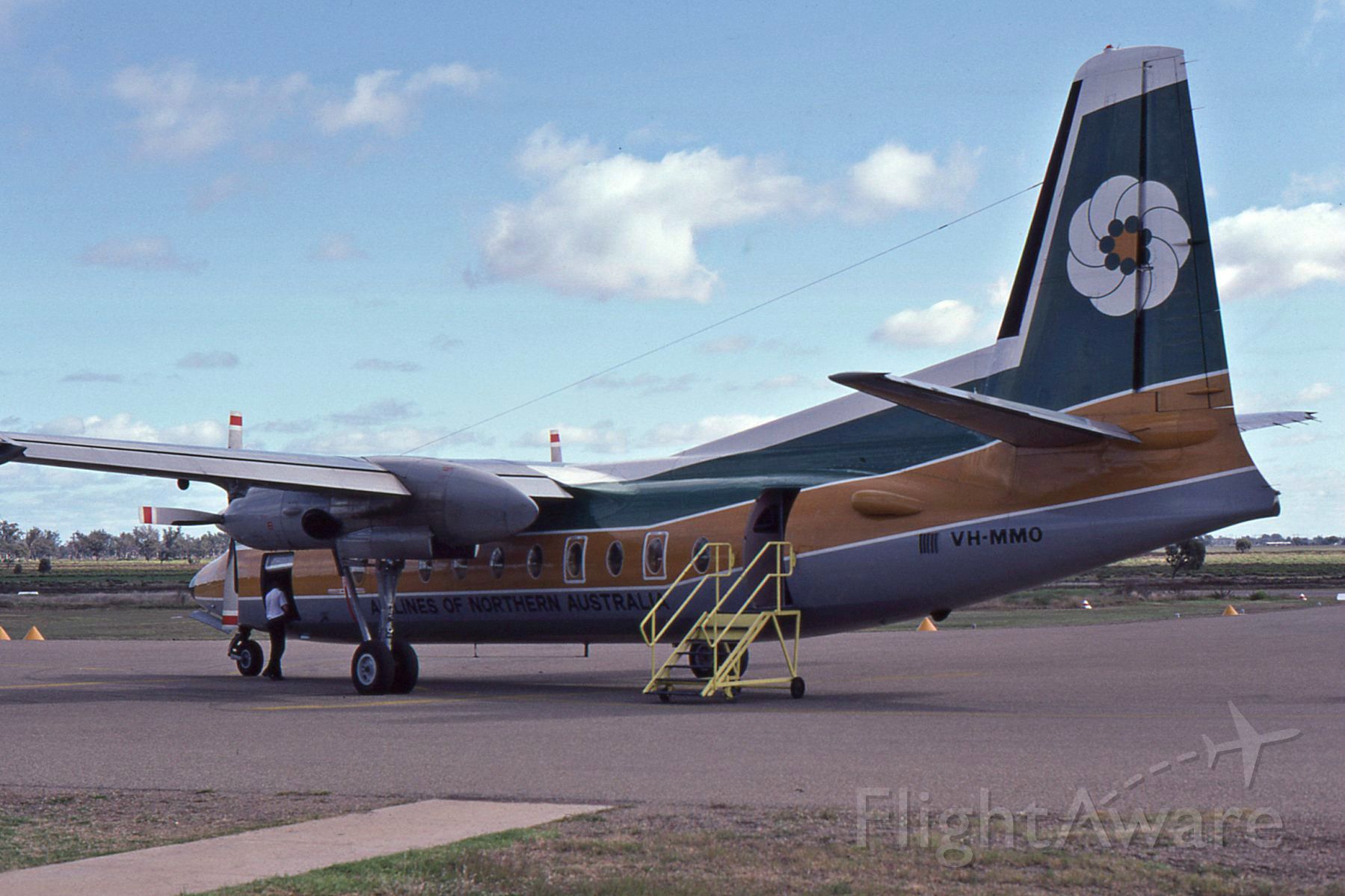 FAIRCHILD HILLER FH-227 (VH-MMO) - Aneett Airlines Fokker F27 VH-MMO at Moree whilst operating an Airlines of NSW Service to Moree from Sydney in 1985.