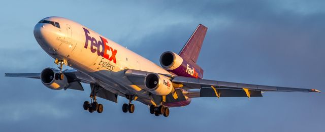 McDonnell Douglas DC-10 (N315FE) - Out early to catch some nice light at sunrise. Here a FEDEX DC10 lines up for runway 23 at YYZ 