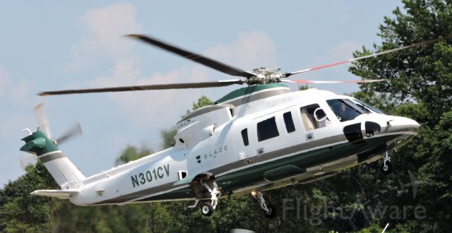 Sikorsky S-76 (N301CV) - This 2007 Sikorsky Helo seconds from landing, summer 2019.
