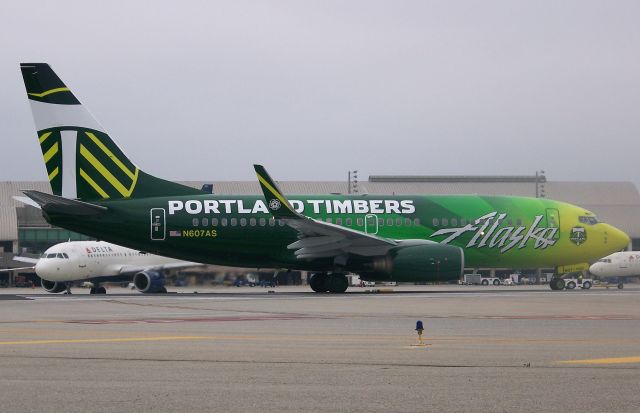 Boeing 737-700 (N607AS) - Special "Portland Timbers" livery 737 is getting ready to depart 19R (now 20R).