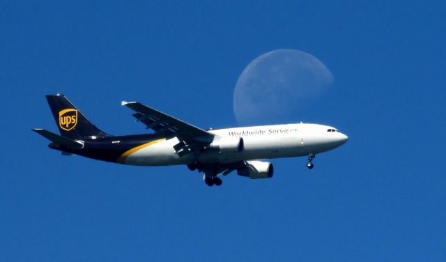 N141UP — - Watching the UPS morning fleet coming in this morning. This A300F4-622R freighter came in on the glide path to runway 35L and passed just under the gibbous waning Moon.  