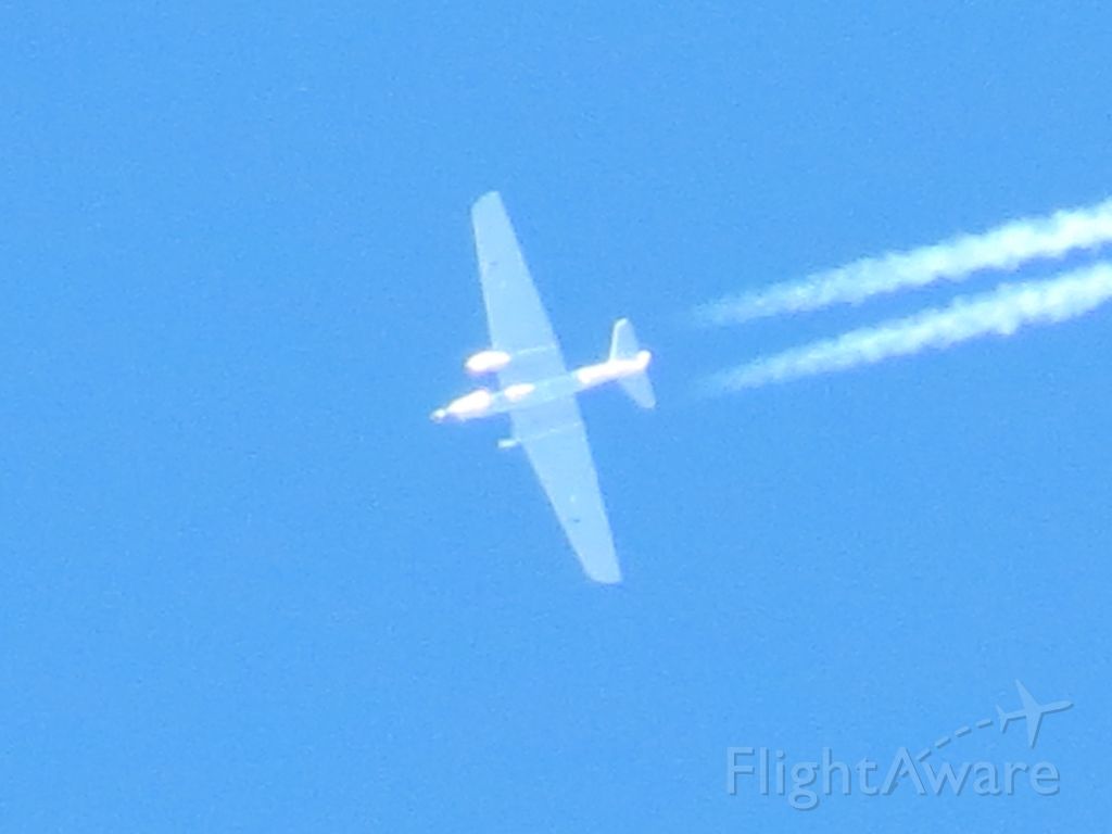 Martin WB-57 — - NASA WB-57 at 58K over Tucson (that is 10.4 MILES AGL), Dec 2012.  Max zoom on the camera