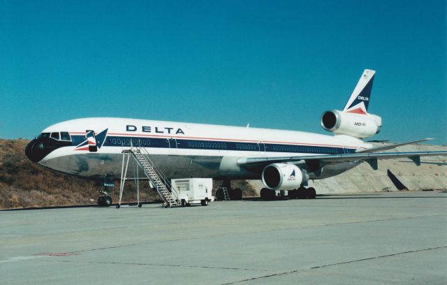 Boeing MD-11 (N807DE) - A Delta MD11 sits outside the TOC  Tech Ops Center in Atlanta, Ga. 5 Feb 2001.