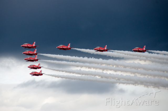 — — - The only flypast the Red Arrows were allowed to do at Farnborough 2016. :-( Wish my shot included the 9th plane!