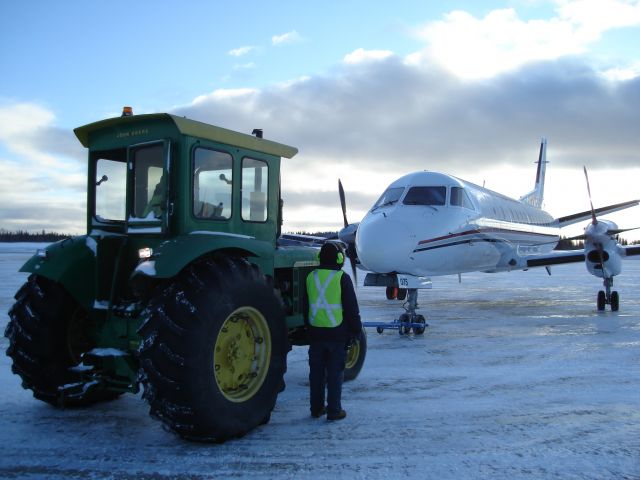 C-GXPS — - Just when you thought you had seen it all!!! John Deere as a pushback tractor!!! Hey...it works!