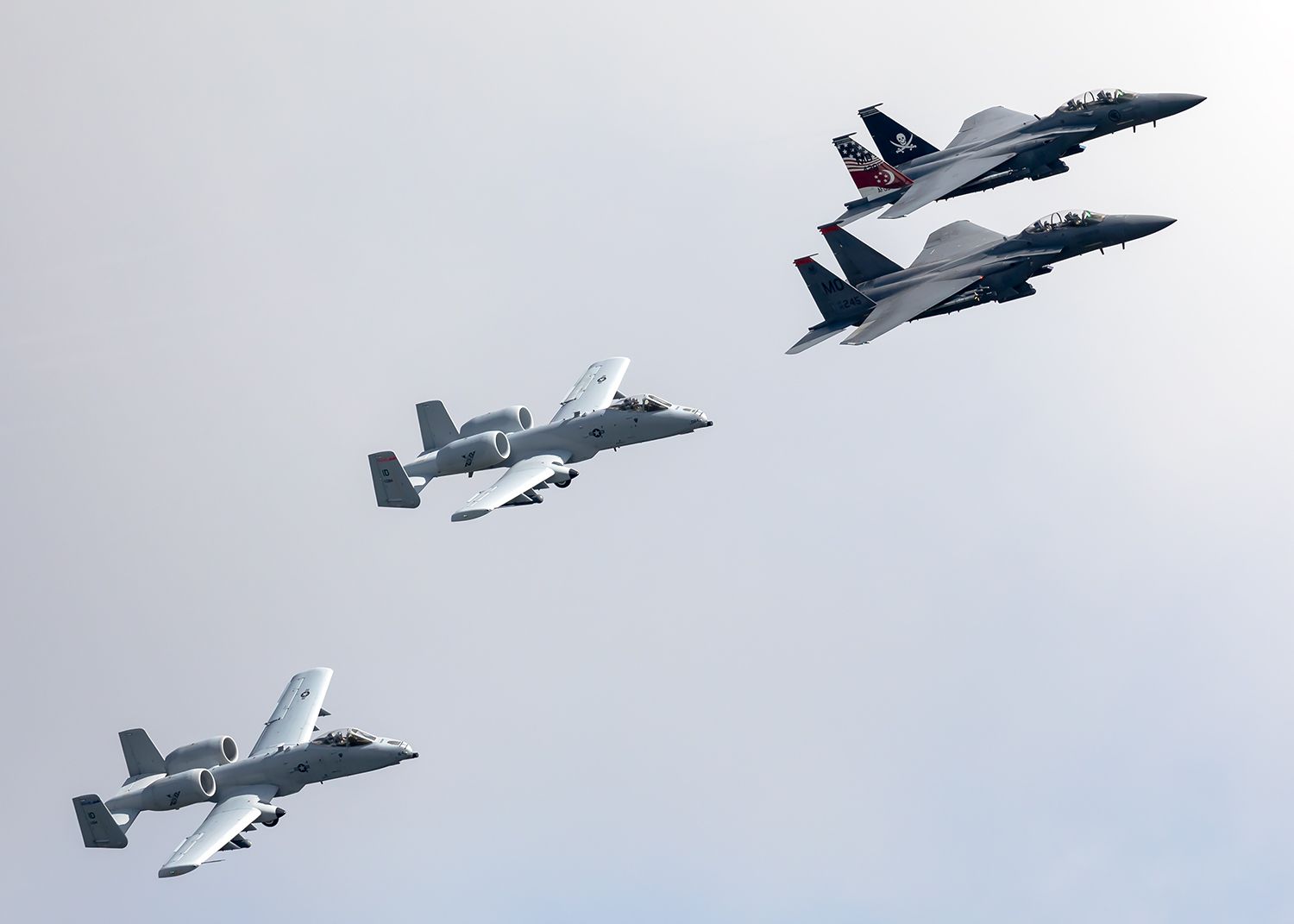 05-0007 — - A flyover to salute the health care workers of southern Idaho from May of this year. Featuring two IDANG A-10's from the 124thFW/190th FS "SkullBangers", F-15E 366th FW "br /Gunfighters/ 391st FS "Bold Tigers" and F-15SG of the Republic of Singapore Air Force 428th FS "Buccaneers"