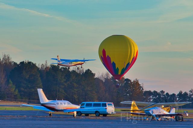 N3121X — - Head Balloons N3121X, model  AX8-105 landing and Caravan N850VY taking off at sunset.