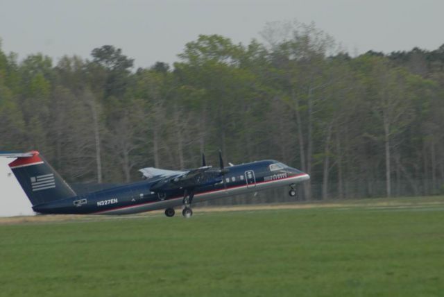 N327EN — - Dash 8 300 Series a/c takingoff towards CLT.