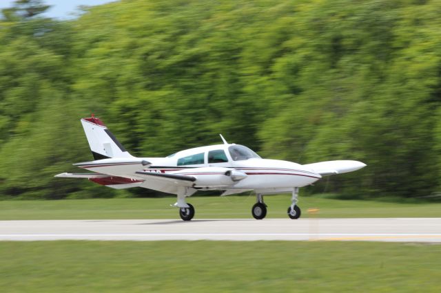 Cessna 310 (N4258C) - Touching down at MCD 